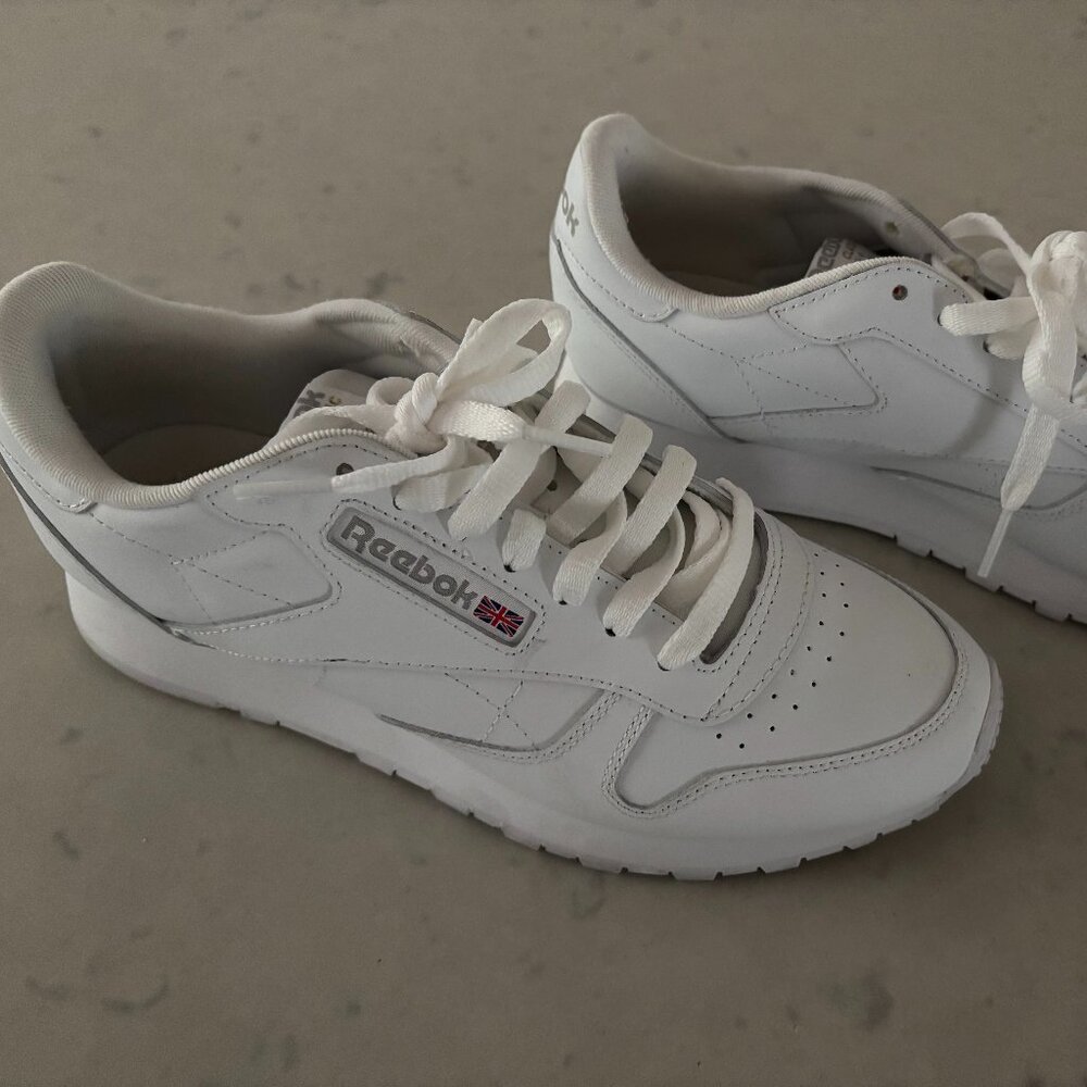 White Reebok Classic tennis shoes